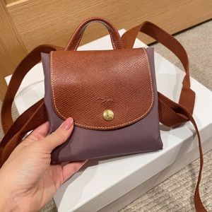 Long champ small backpack purple nylon bag.